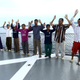 Vietnamese fisherman raise their hand as they are detained onboard an Indonesian warship.
